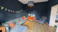 Wohnzimmer - „AM WALLGARTEN“ IM HERZEN VON KR-UERDINGEN – SCHÖN AUFGETEILTE 3,5 ZKDB-ALTBAUWOHNUNG + SÜD-BALKON